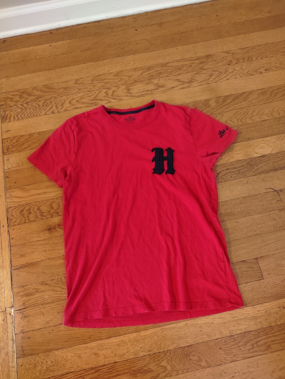 hollister red t shirt with embroidered H, with los angeles on sleeve size small